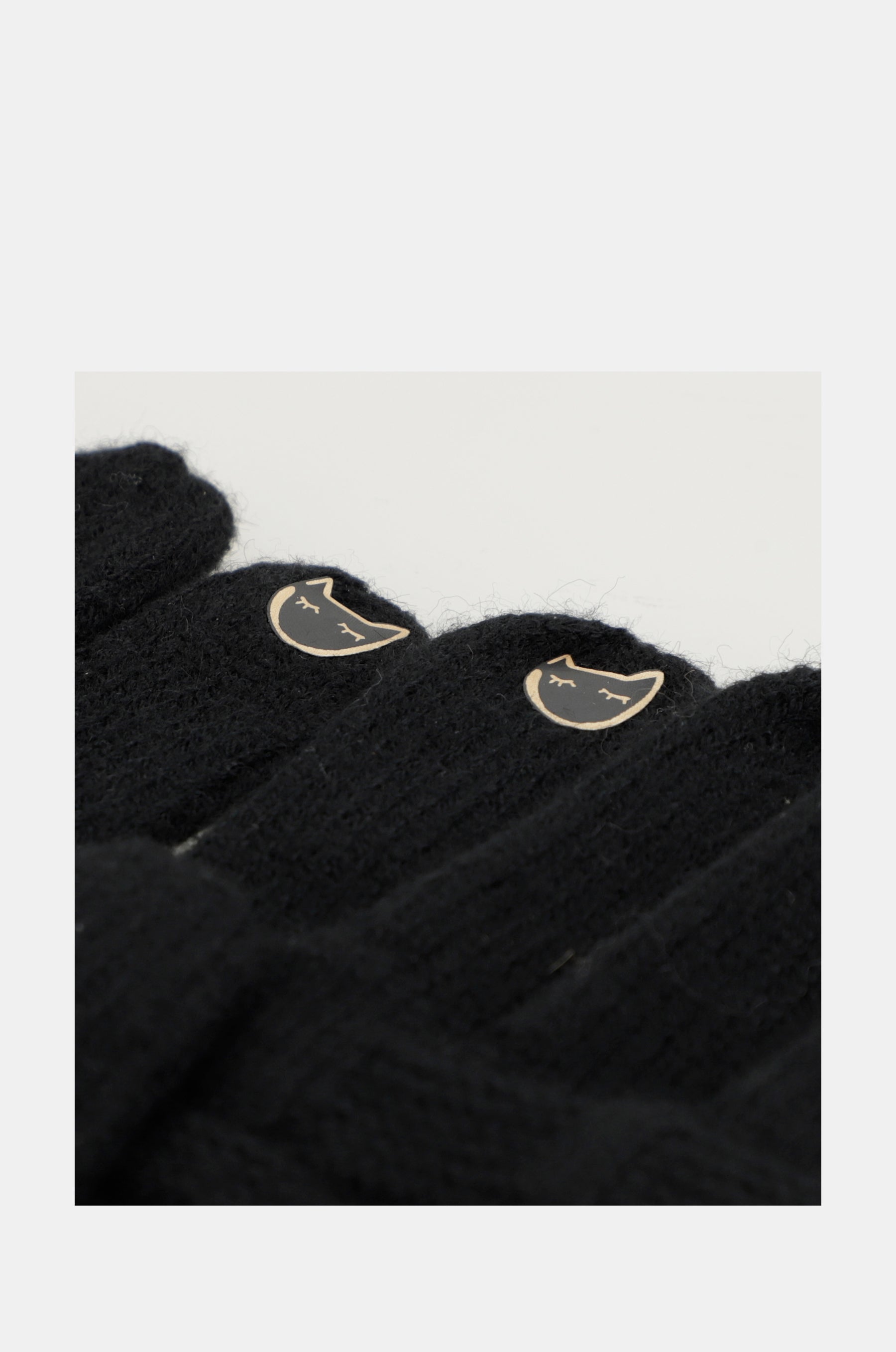 Schwarze Strickhandschuhe