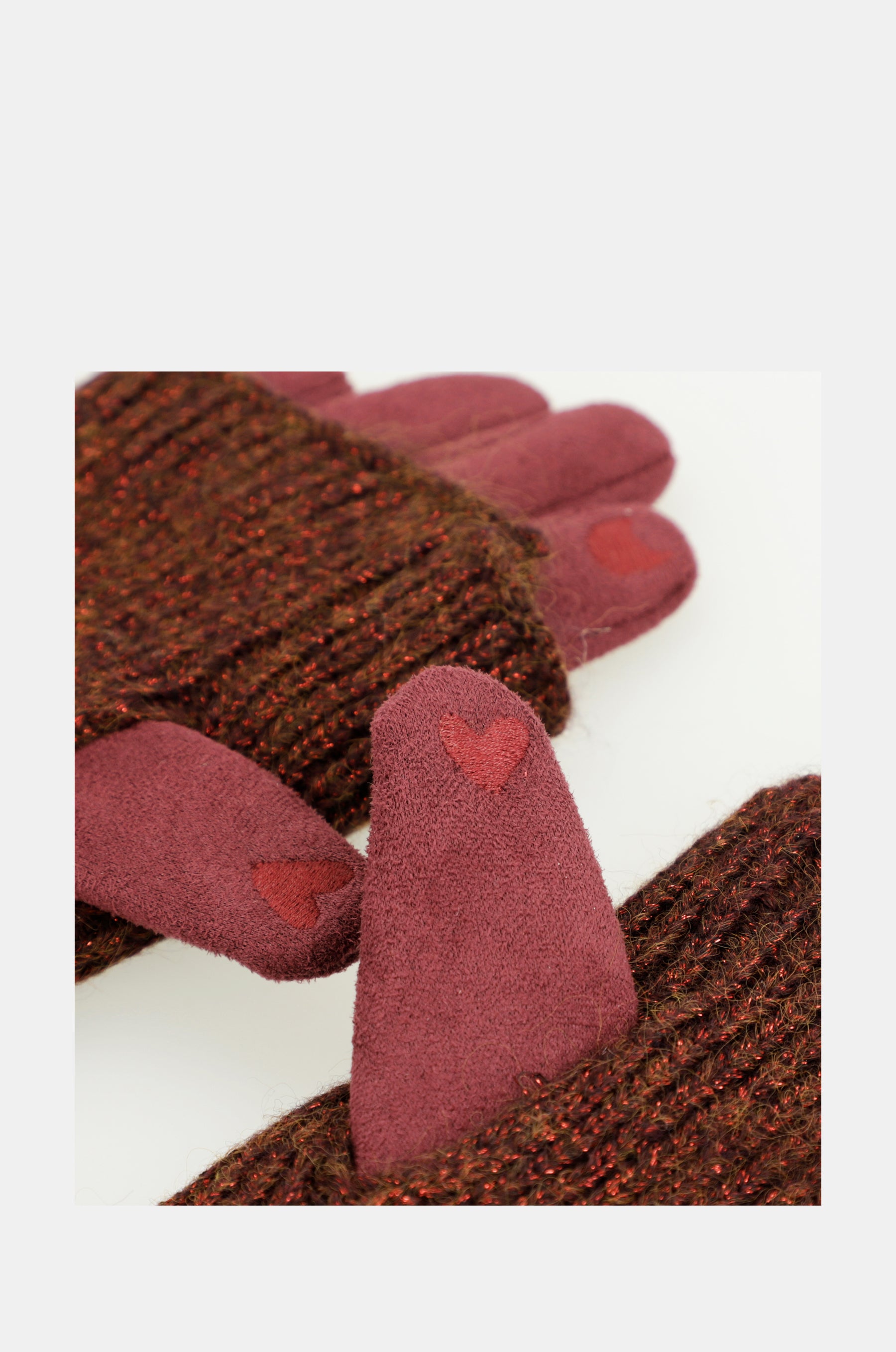 Burgunderrote, ausziehbare Handschuhe