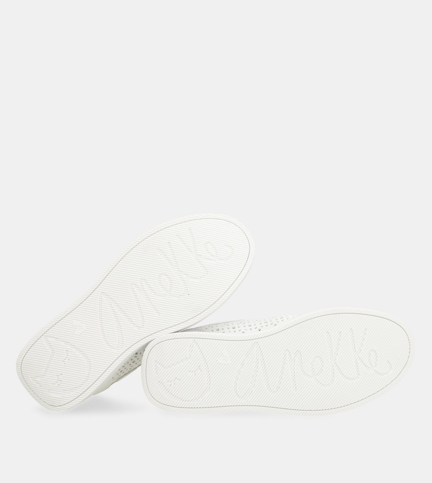 Weiße gefleckte Sneakers