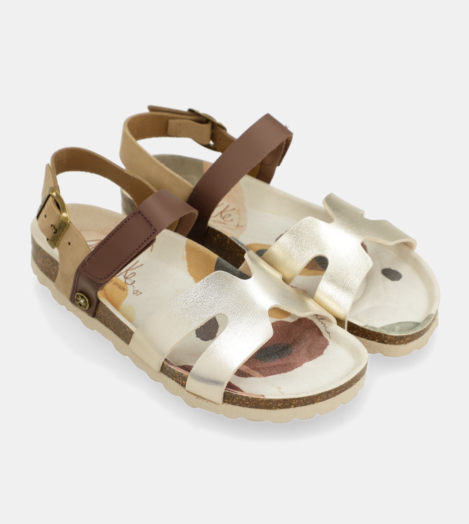 Goldene und braune Sandalen