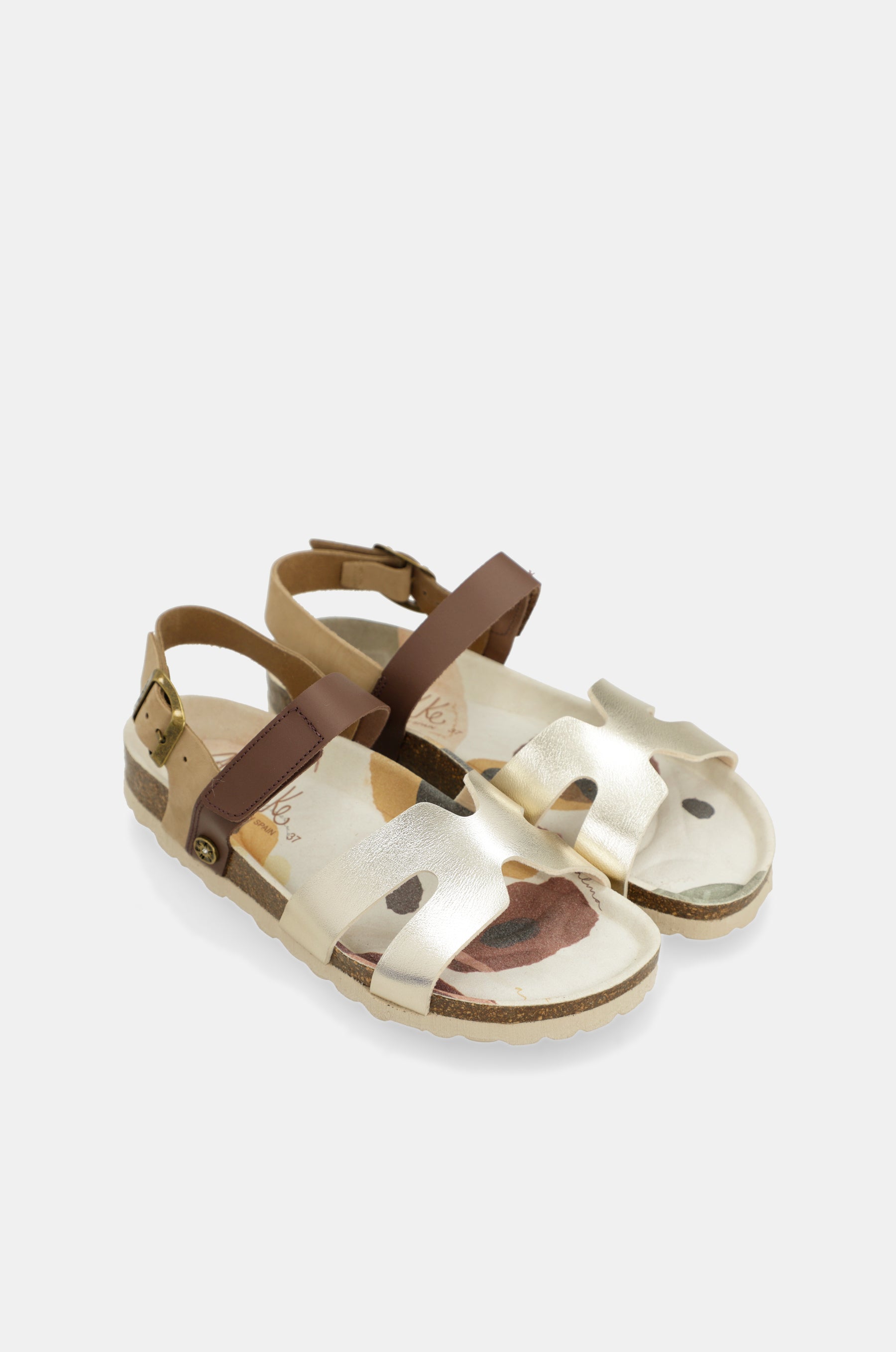 Goldene und braune Sandalen