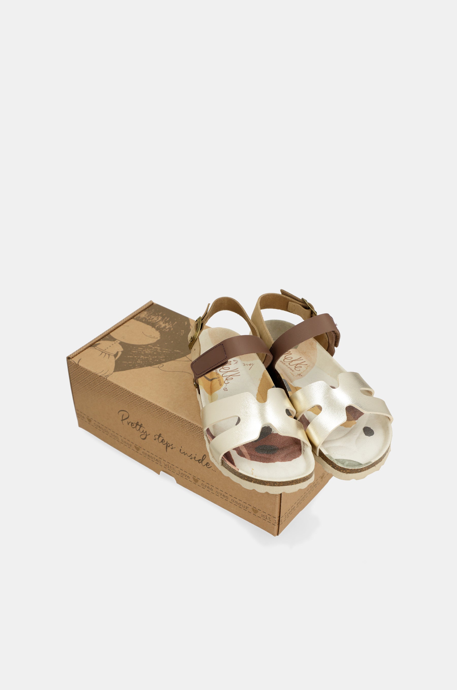 Goldene und braune Sandalen
