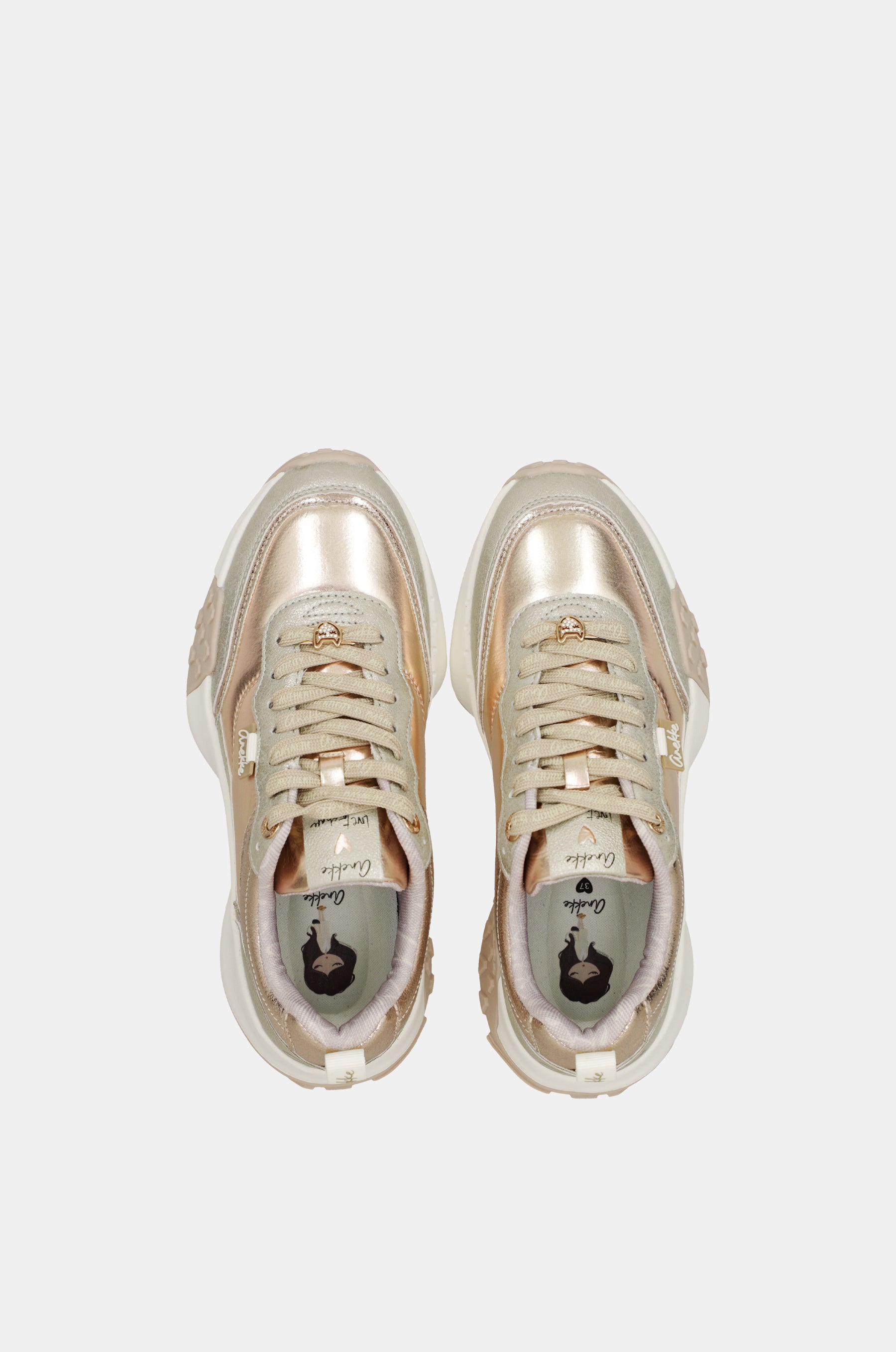 Goldene Sneaker