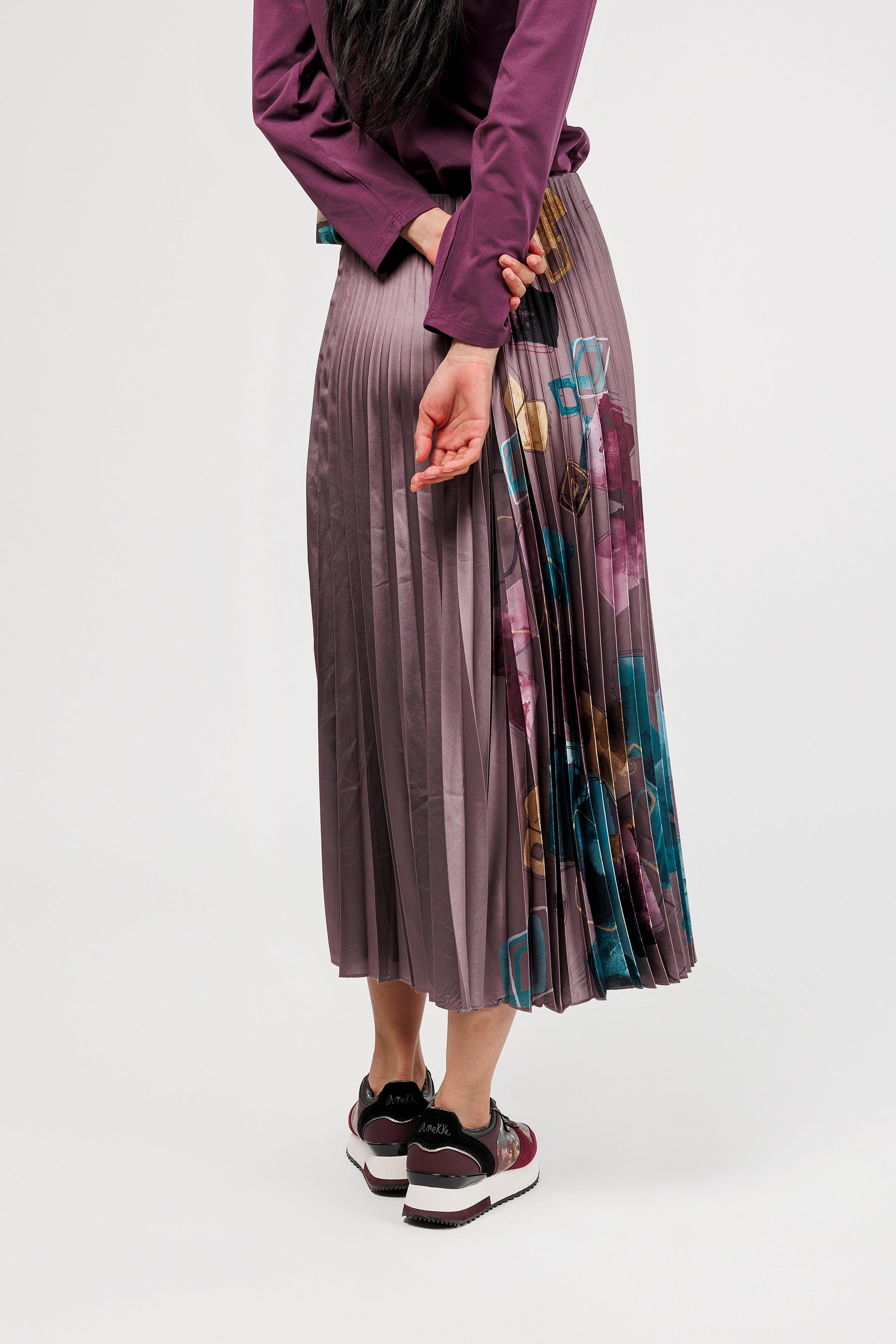 Faltenrock violett