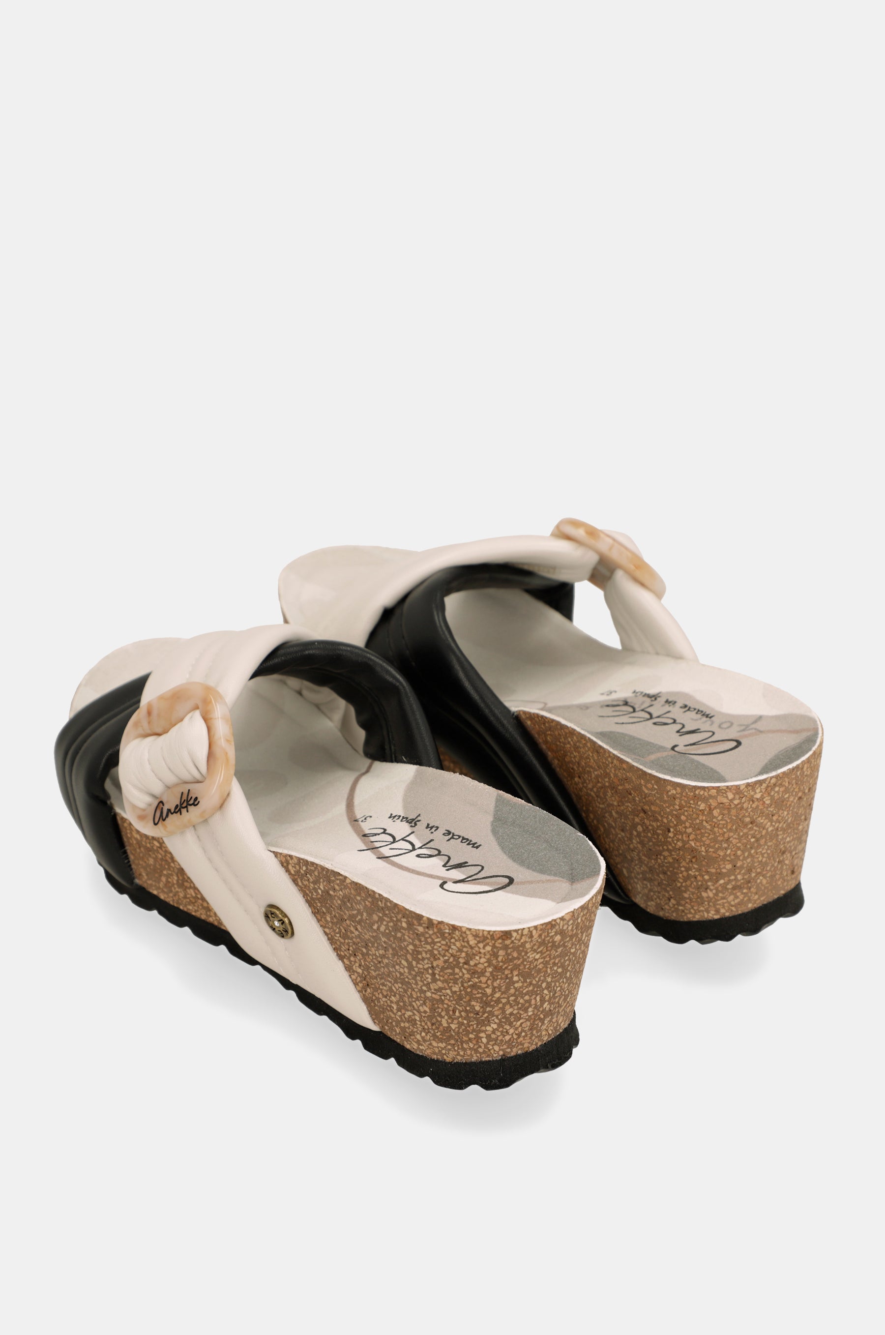 Schwarz-weiße Kreuzsandalen