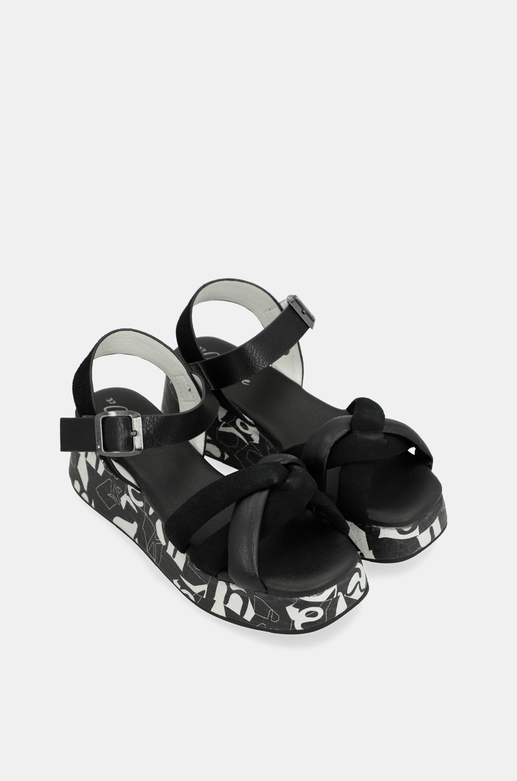 Schwarz-weiße Plateausandalen