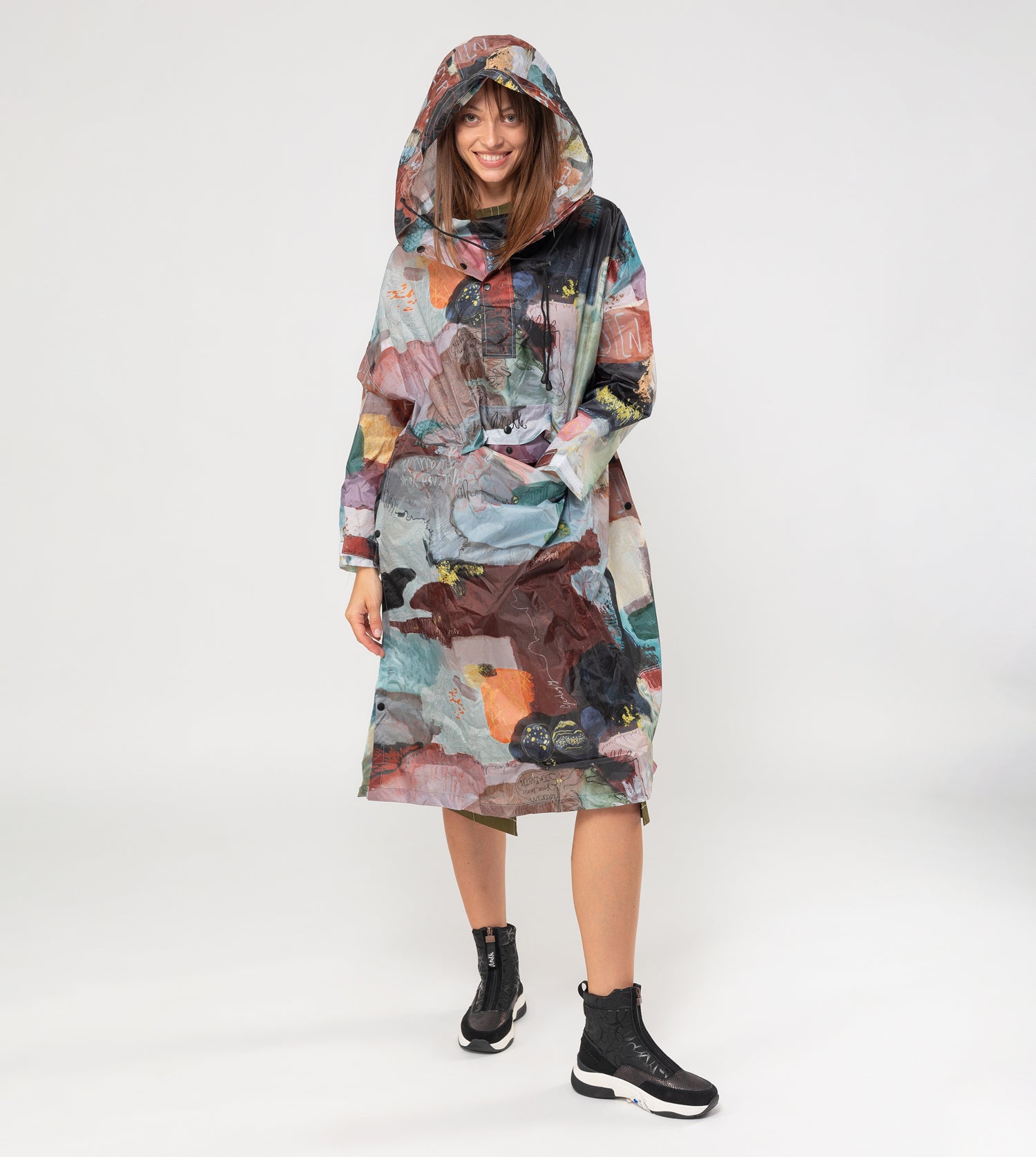 Faltbare grüne Regenjacke